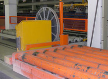 Several transfer cars. Power supply by Motorized Cable Reels. Laminate and flake board production.